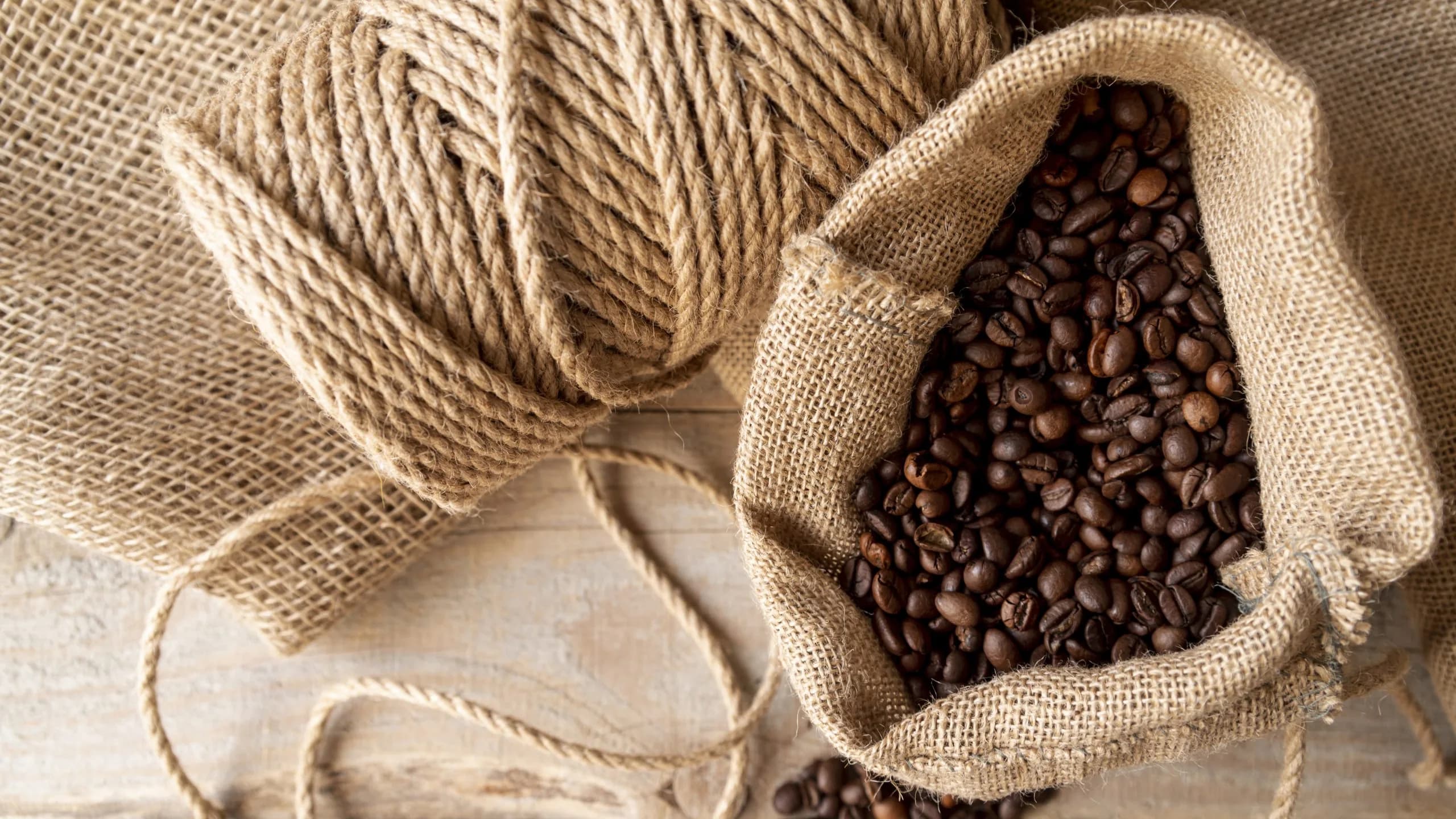 Hessian burlap sack filled with coffee beans
